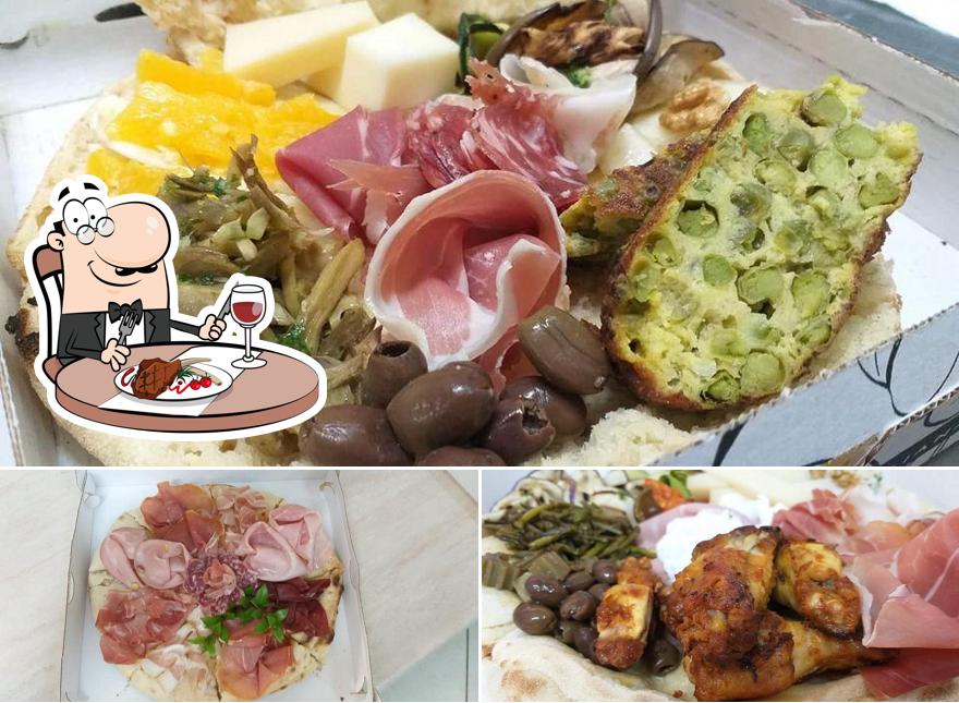 Prenditi i piatti di carne a Pizzeria Il Molo