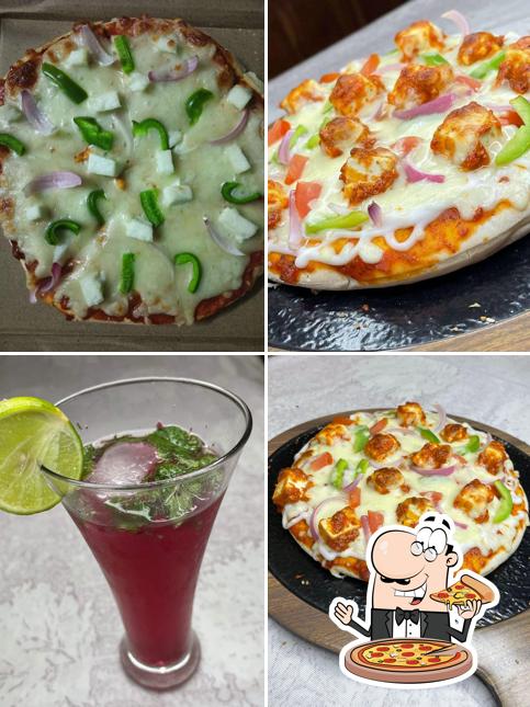 Get pizza at Cheesy Krust