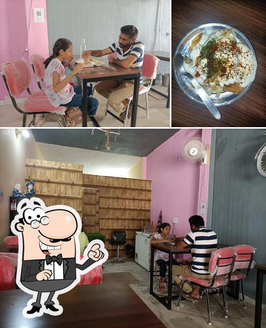 This is the photo showing interior and food at RJ Food Point