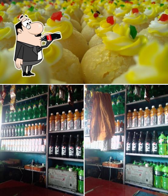 Take a look at the image depicting drink and sushi at Mahesh Cold Drinks