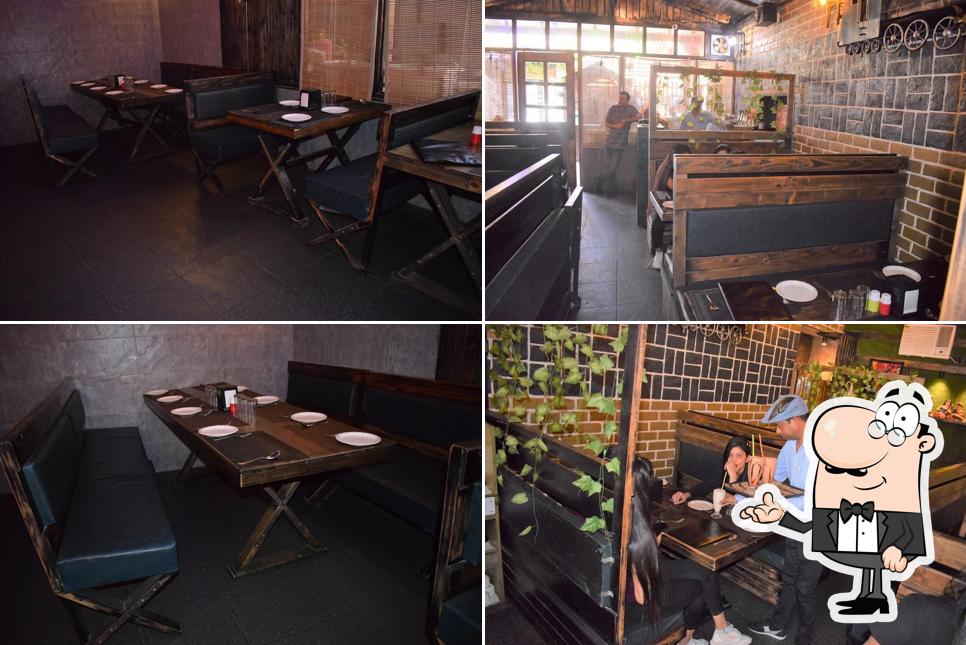 Take a seat at one of the tables at City Heart Family Restaurant - Best Family Restaurant