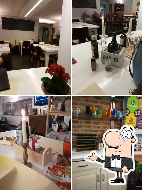 Dai un'occhiata agli interni di Pizzeria Osteria Bano