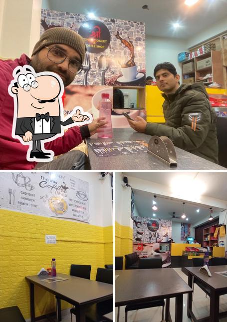 Among various things one can find interior and beverage at Shri confectionery & coffee shop