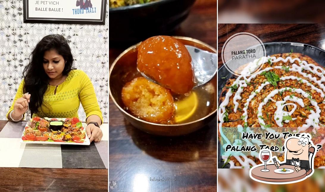 The photo of food and exterior at Swaad Punjabi