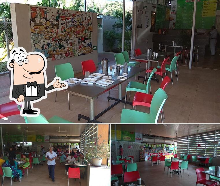 Take a seat at one of the tables at Vitthal Kamat