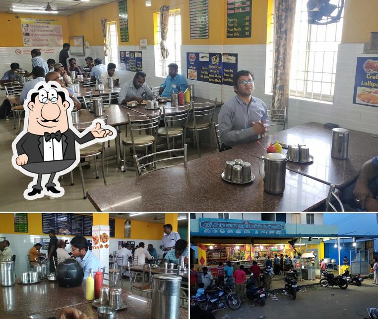 Take a seat at one of the tables at Hotel Amma