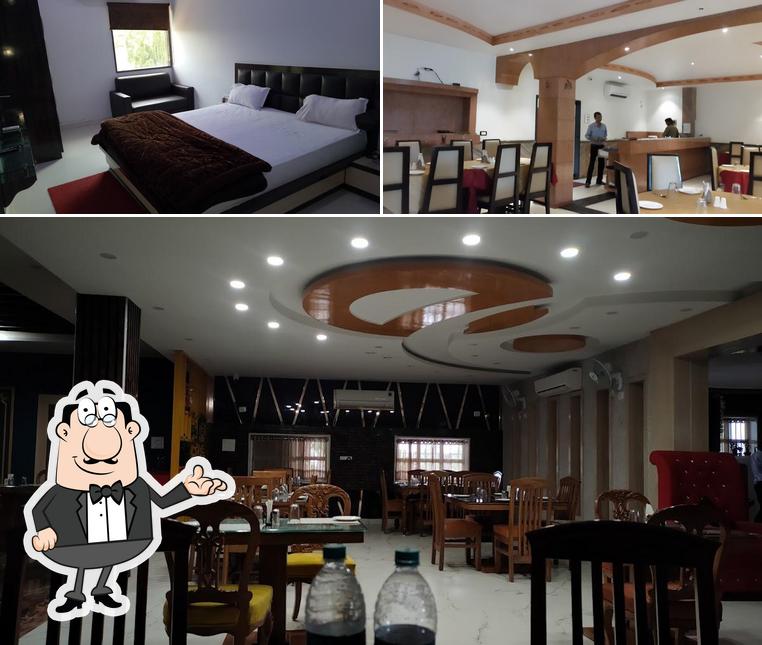 Take a seat at one of the tables at Hotel RituRaj