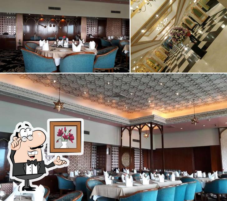 Take a seat at one of the tables at Mughal Room