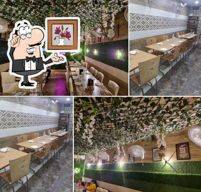 Take a seat at one of the tables at Chawla's Veg Kitchen