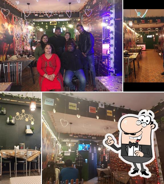 Take a seat at one of the tables at SA-RANG-HAE CAFE SIP OF LOVE