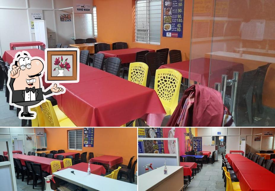 Take a seat at one of the tables at TEJA'S ANDHRA BHOJANAM