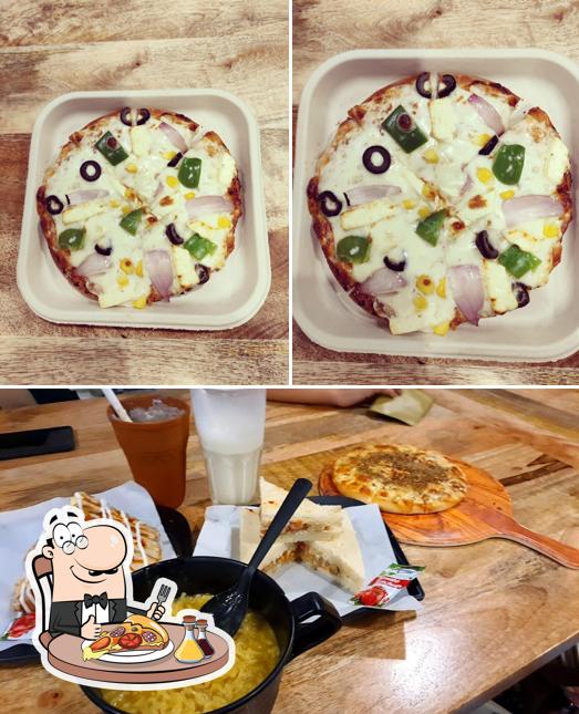 Get pizza at Chai Sutta Bar