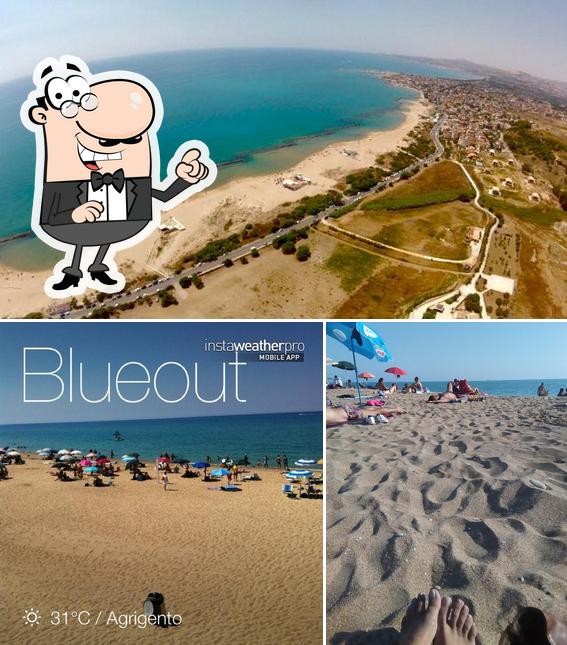 Goditi la vista dagli esterni di Blueout Stabilimento Balneare & Beach Bar