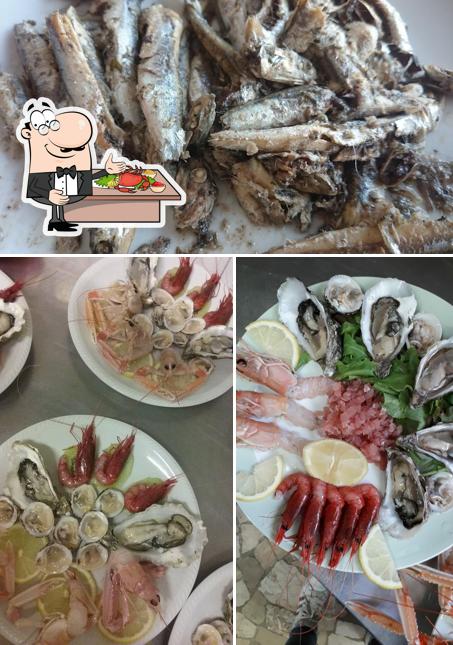 Ordina la cucina di mare a Trattoria al Camionista