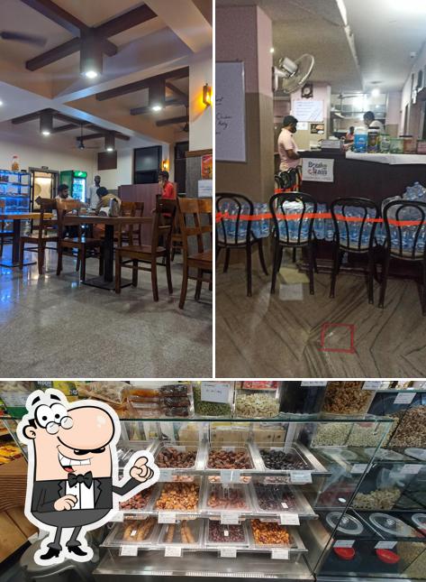 Take a seat at one of the tables at Union Restaurant, Nilambur