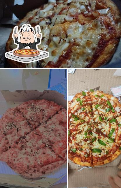 Try out pizza at Domino’s Pizza