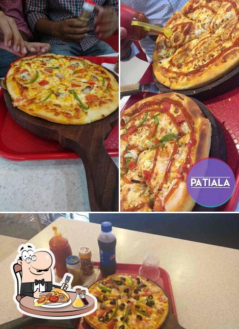 Get pizza at Hangout Pizza & Fried Chicken