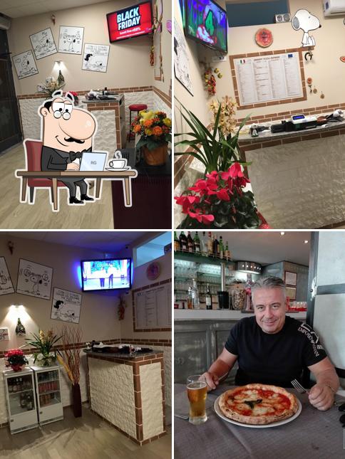 Siediti a un tavolo di Pizzeria D'Asporto Snoopy Di D'Angelo Luigi