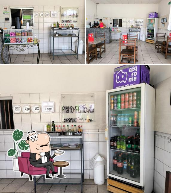 Sente em uma das mesas no Zaratin restaurante