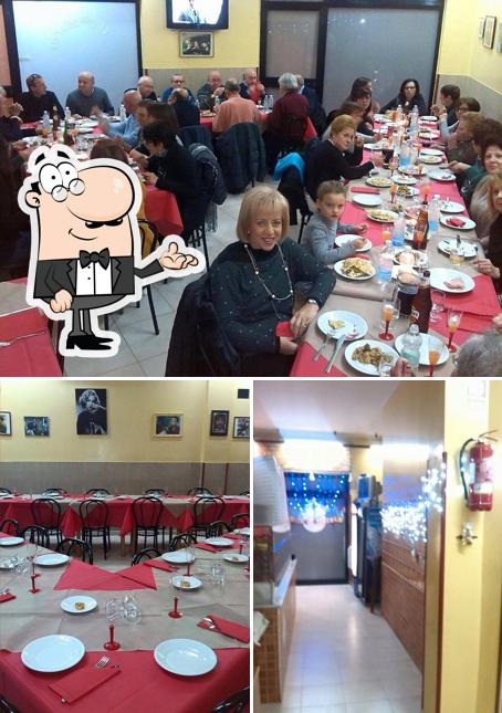 Siediti a un tavolo di L'angolo della pizza