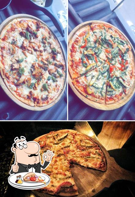 Try out pizza at Studio XO Bar