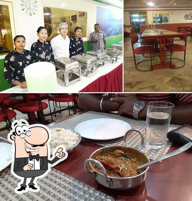 The interior of The Silver Oak Restaurant - Multi cuisine by Shevaroys