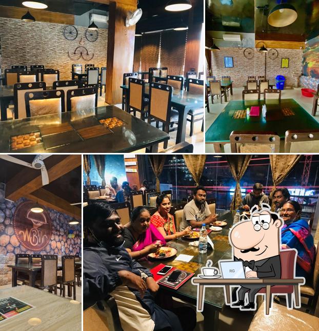 Take a seat at one of the tables at Wah Biryani Waah! Family Restaurant