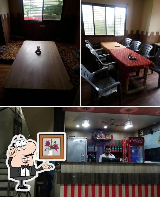Take a look at the picture displaying interior and beverage at Hotel sangam