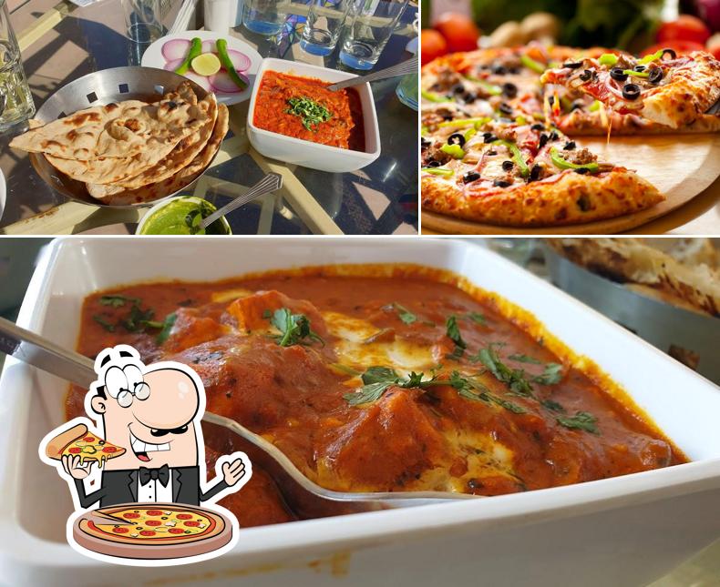 Order pizza at Indique Restaurant & Bar