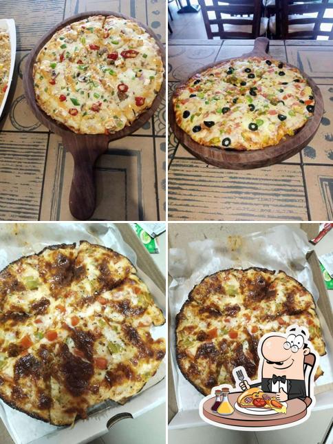 Pick pizza at Den’s Pizza