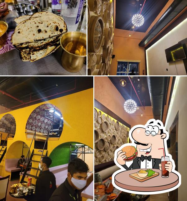 Order a burger at Pind Balluchi Gaur City Mall Noida