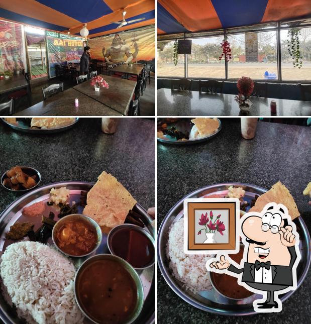 Among various things one can find interior and food at Aai Hotel