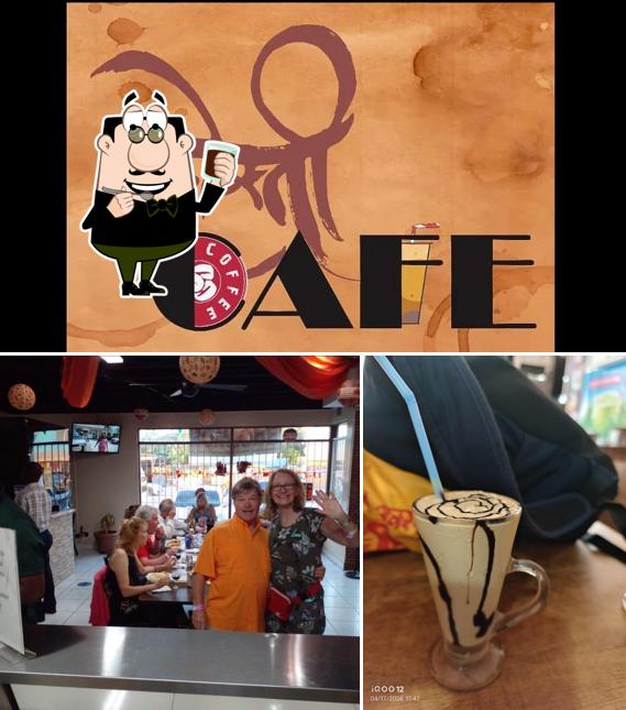 Enjoy a beverage at Sandy's Dosti cafe