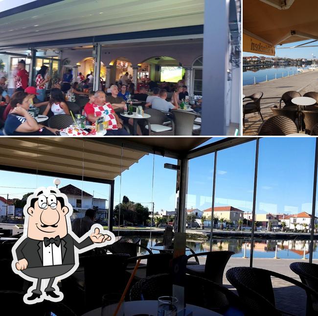 Siediti a un tavolo di Caffe Bar Fortuna