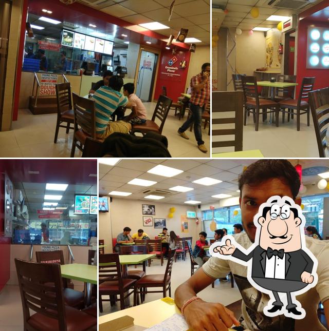 Take a seat at one of the tables at Domino's Pizza Vidya Nagar, Bhopal