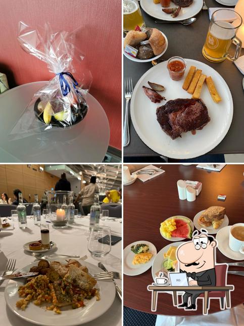 Guarda la immagine che mostra la interni e cibo di Hilton Geneva Hotel & Conference Centre