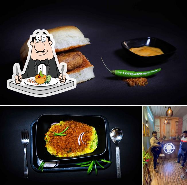 Take a look at the picture showing food and interior at Urban Vada Pav