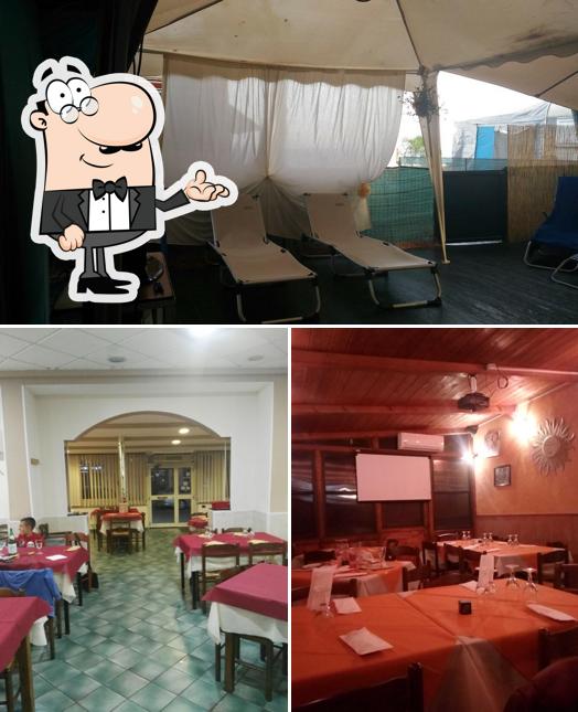 Dai un'occhiata agli interni di Pizzeria Ciro&Ciro Express