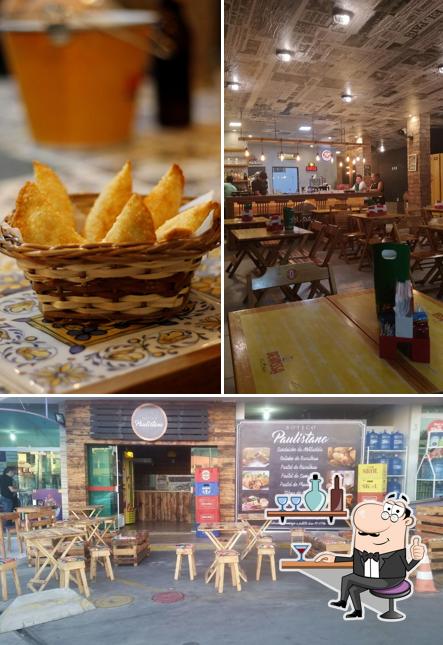 A imagem da interior e comida no Boteco Paulistano
