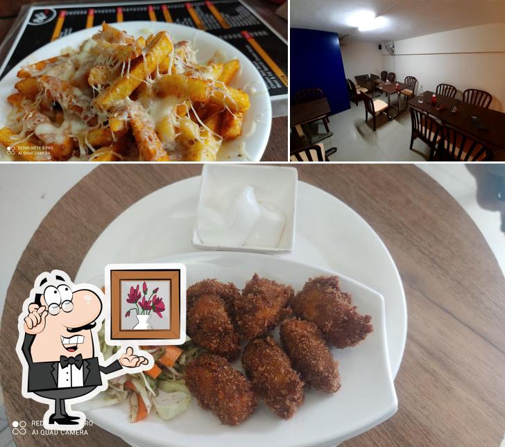 Among various things one can find interior and food at Meet and Eat cafe