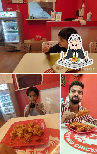 Take a look at the image displaying food and interior at PFC Fast Food