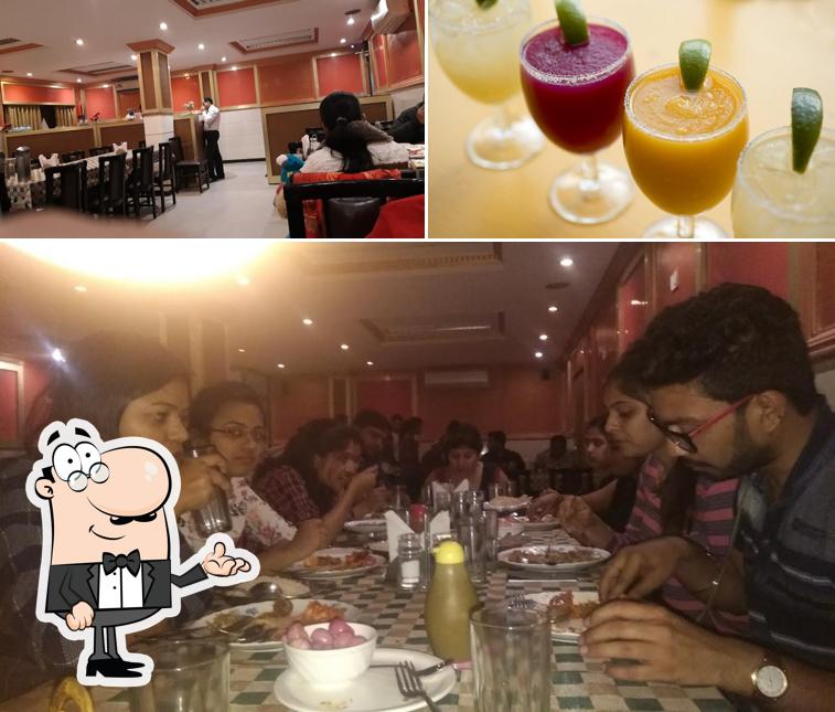 The picture of interior and beverage at Lucky Restaurant