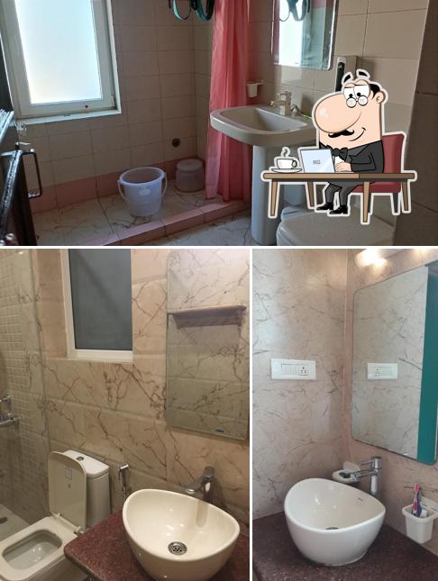 Take a seat at one of the tables at MVT Guest House & Restaurant