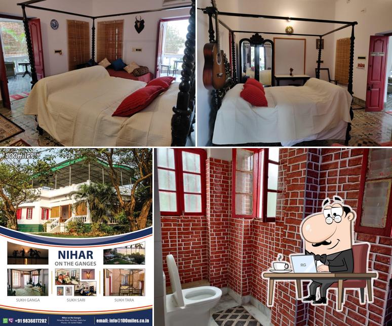 Take a seat at one of the tables at Nihar on the Ganges Resort marriage hall