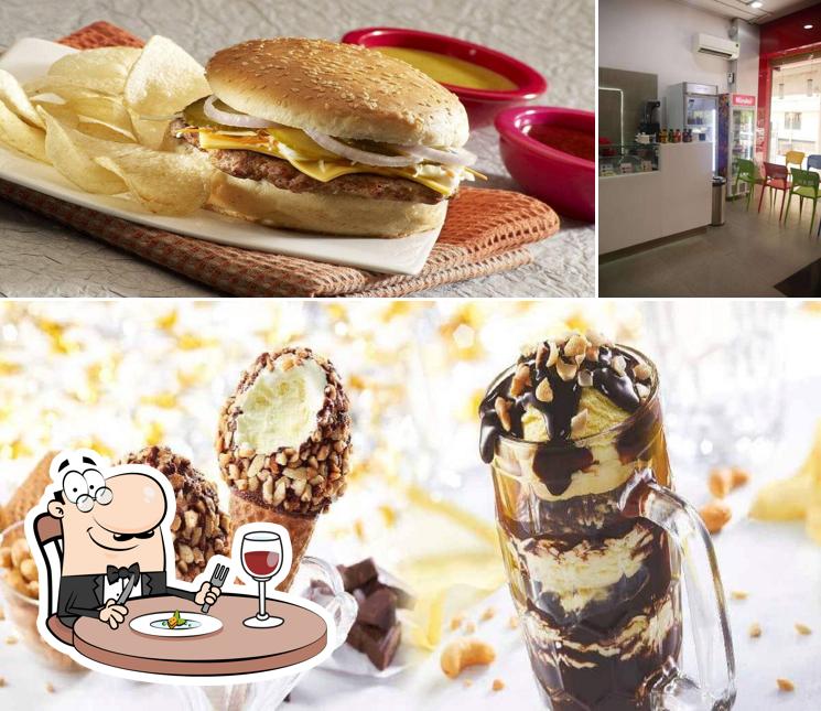 Take a look at the image displaying food and interior at Nirula's