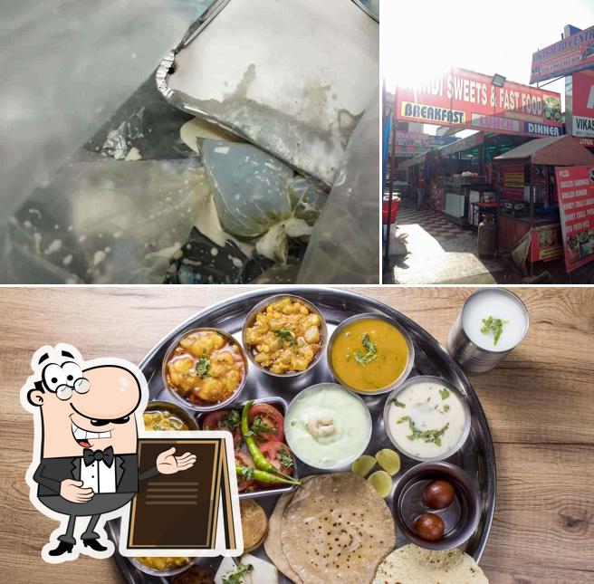 Among various things one can find exterior and food at Shirdi Sweets