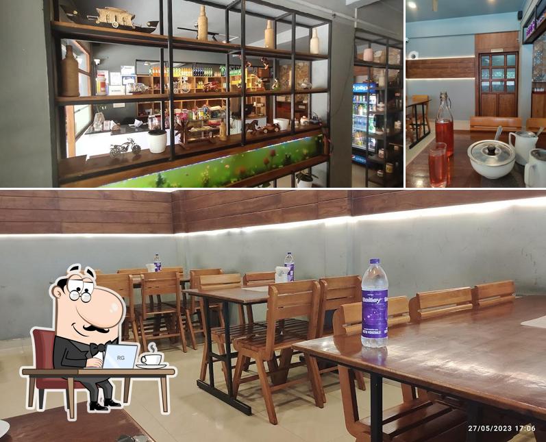 Check out the picture depicting interior and beverage at Kitchen 34 Family Restaurant