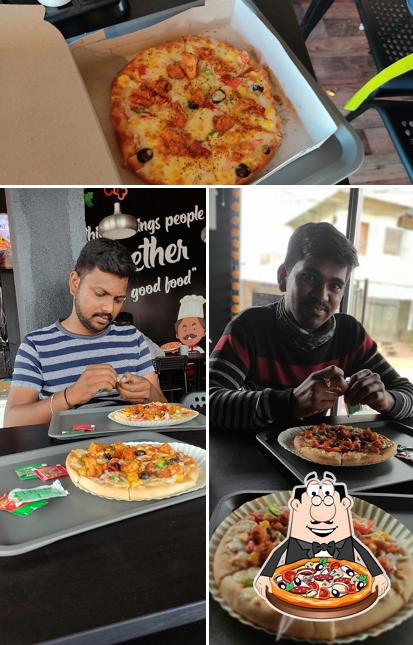Get pizza at Heaven's Café