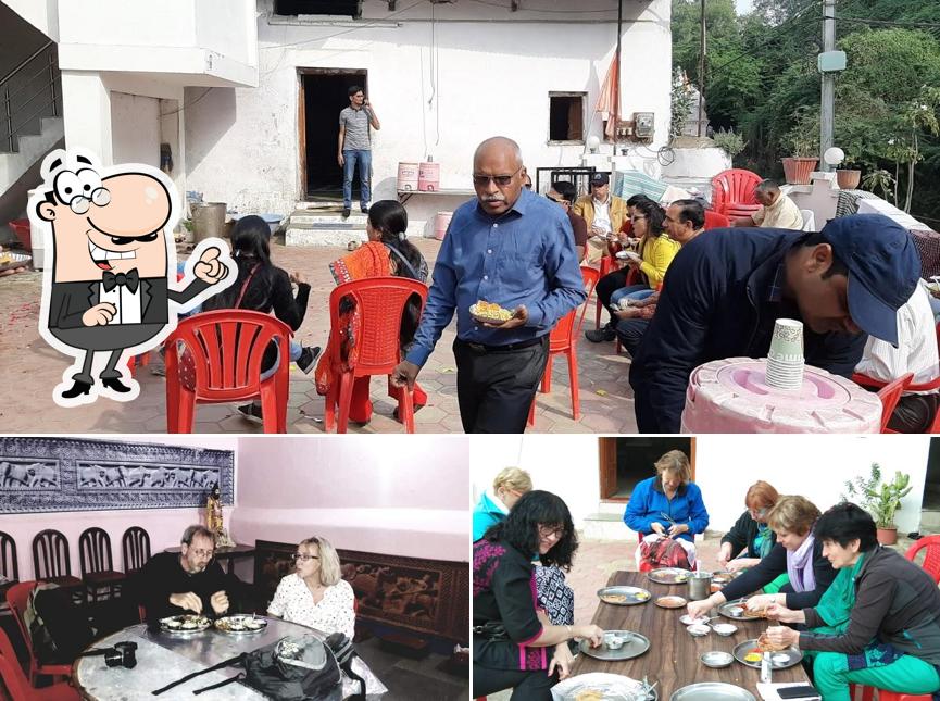 Take a seat at one of the tables at Banke Bihari Bhojnalaya
