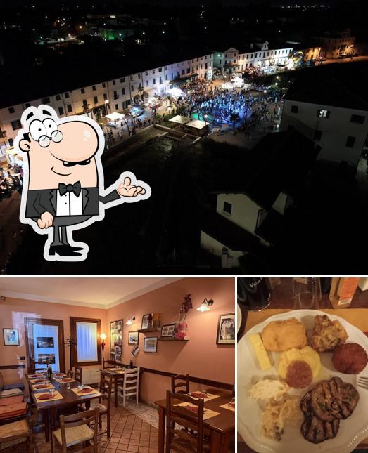 Siediti a un tavolo di Osteria Ae Porte